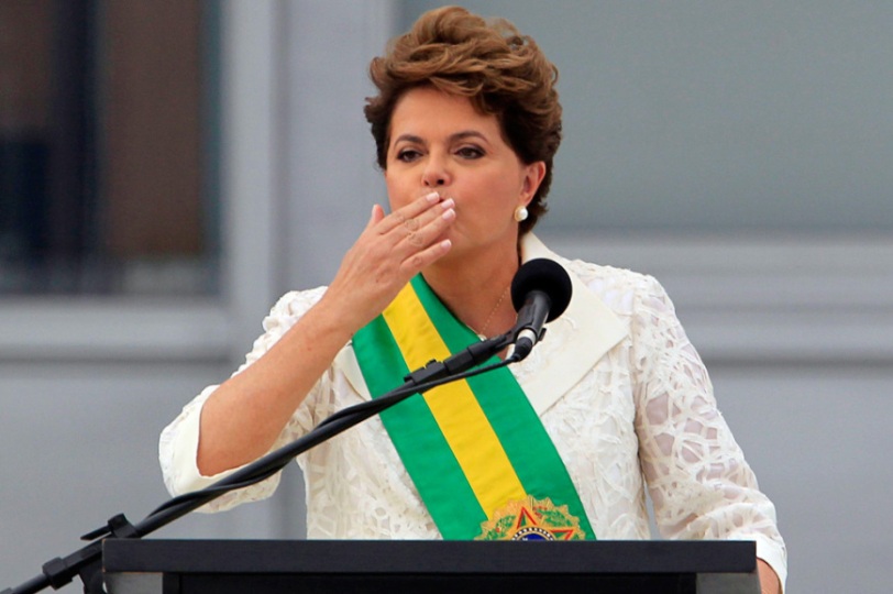 Brazil's President Dilma Rousseff blows a kiss to the public while giving a speech in front of Planalto Palace in Brasilia